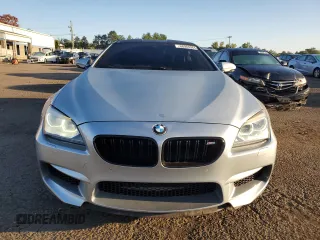 2013 BMW M6 z VIN WBSLX9C58DD159800, wystawiony jako Copart lot #68904984 z przebiegiem 107 426 mil mil oraz Szkoda całkowita • Salvage title. Historia ofert i sprzedaży dostępna na DreamBid. Obrazek 5.