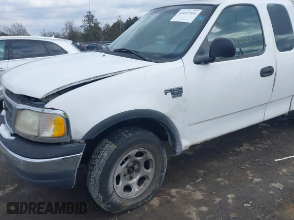 1999 Ford F-150 с VIN 1FTRX18W2XNB30523, выставлен на аукционе IAAI как лот 41617531 с пробегом 319 673 миль миль и . История ставок и продаж доступна на DreamBid. Изображение 6.