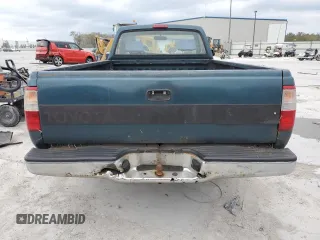 1994 Toyota T100 DX with VIN JT4VD10A6R0017701, listed as a Copart auction lot 46034975 with 219,651 mi miles and Salvage Title. Bid and sale history available at DreamBid. Image 6.