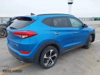 2016 Hyundai Tucson Eco with VIN KM8J3CA28GU041357, listed as a IAAI auction lot 41661997 with 87,000 mi miles. Bid and sale history available at carsss.com. Image 4.