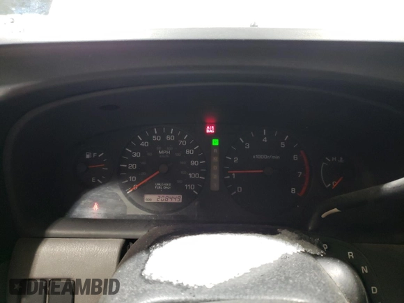 2000 Nissan Frontier XE z VIN 1N6DD21S1YC392012, wystawiony jako Copart lot #41843855 z przebiegiem 208 449 mil mil oraz Szkoda całkowita • Salvage title. Historia ofert i sprzedaży dostępna na DreamBid. Obrazek 9.