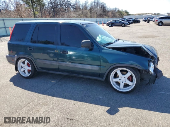 1997 Honda CR-V z VIN JHLRD1853VC063765, wystawiony jako Copart lot #53443435 z przebiegiem 226 898 mil mil oraz Szkoda całkowita • Salvage title. Historia ofert i sprzedaży dostępna na DreamBid. Obrazek 4.
