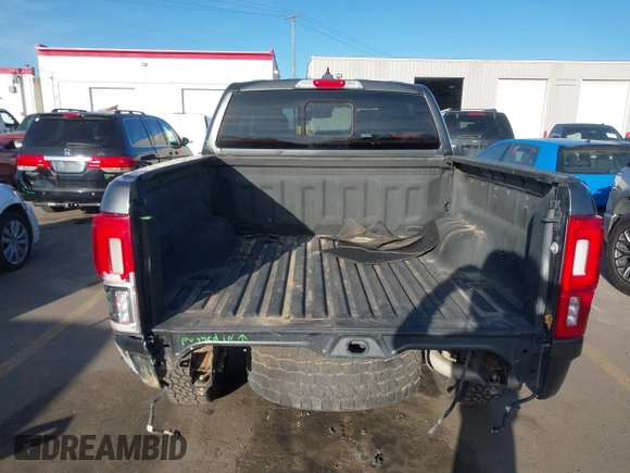 2019 Ford Ranger XL with VIN 1FTER4FH1KLA05404, listed as a IAAI auction lot 41657266 with 102,356 mi miles and . Bid and sale history available at DreamBid. Image 17.