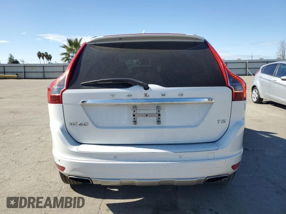 2015 Volvo XC60 T5 Drive-E Premier z VIN YV440MDB7F2602716, wystawiony jako Copart lot #43380785 z przebiegiem 78 357 mil mil oraz Szkoda całkowita • Salvage title. Historia ofert i sprzedaży dostępna na DreamBid. Obrazek 6.