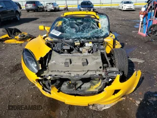 2005 Lotus Elise z VIN SCCPC11185HL34674, wystawiony jako Copart lot #50975385 z przebiegiem 63 194 mil mil oraz Szkody całkowita. Historia ofert i sprzedaży dostępna na DreamBid. Obrazek 5.