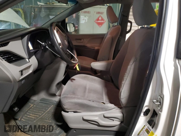 2015 Toyota Sienna L with VIN 5TDZK3DC0FS597860, listed as a Copart auction lot 43440125 with 138,375 mi miles and Salvage title. Bid and sale history available at DreamBid. Image 7.