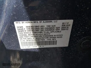2017 Honda Pilot Touring with VIN 5FNYF6H93HB017623, listed as a IAAI auction lot 41996650 with 97,946 mi miles. Bid and sale history available at carsss.com. Image 9.