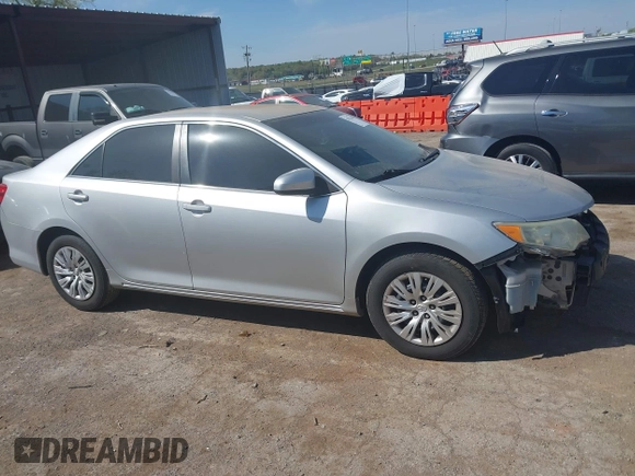 2014 Toyota Camry L with VIN 4T4BF1FK0ER421918, listed as a IAAI auction lot 42027646 with 152,088 mi miles and . Bid and sale history available at DreamBid. Image 13.