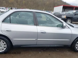 2001 Honda Accord LX z VIN 1HGCG56491A098359, wystawiony jako IAAI lot #42021768 z przebiegiem 122 121 mil mil oraz . Historia ofert i sprzedaży dostępna na DreamBid. Obrazek 13.