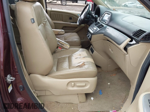 2009 Honda Odyssey Touring with VIN 5FNRL38929B037150, listed as a IAAI auction lot 42319657 with 183,663 mi miles and . Bid and sale history available at DreamBid. Image 5.