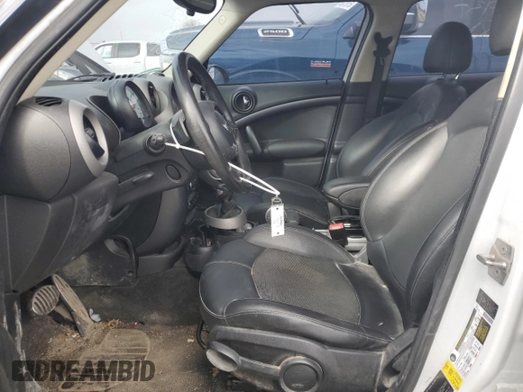 2012 MINI Countryman S with VIN WMWZC3C50CWL85937, listed as a Copart auction lot 46648585 with 141,921 mi miles and Salvage Title. Bid and sale history available at DreamBid. Image 7.