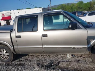 2003 GMC Sonoma SLS with VIN 1GTDT13X73K115033, listed as a IAAI auction lot 41964731 with 192,356 mi miles and . Bid and sale history available at DreamBid. Image 13.
