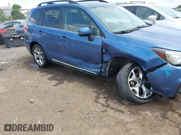 2017 Subaru Forester Touring with VIN JF2SJAWC7HH455648, listed as a IAAI auction lot 42118358 with 58,123 mi miles and . Bid and sale history available at DreamBid. Image 6.