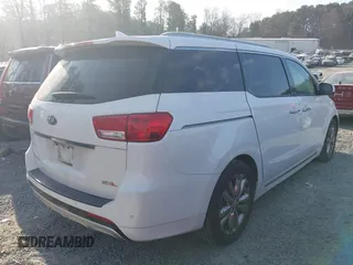 2016 Kia Sedona SX-L with VIN KNDME5C1XG6112686, listed as a IAAI auction lot 41662067 with 146,975 mi miles. Bid and sale history available at carsss.com. Image 4.