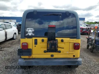 2001 Jeep Wrangler Sport z VIN 1J4FA49S01P355451, wystawiony jako Copart lot #56501545 z przebiegiem 213 027 mil mil oraz Czysty tytuł • Clean title. Historia ofert i sprzedaży dostępna na DreamBid. Obrazek 6.