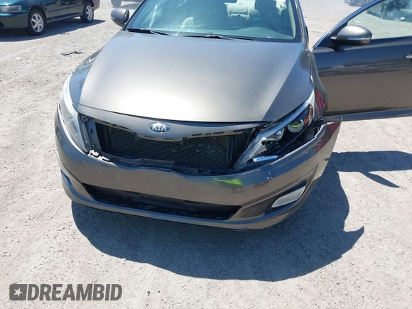2014 Kia Optima LX with VIN 5XXGM4A71EG335165, listed as a IAAI auction lot 42052378 with 154,574 mi miles. Bid and sale history available at carsss.com. Image 6.