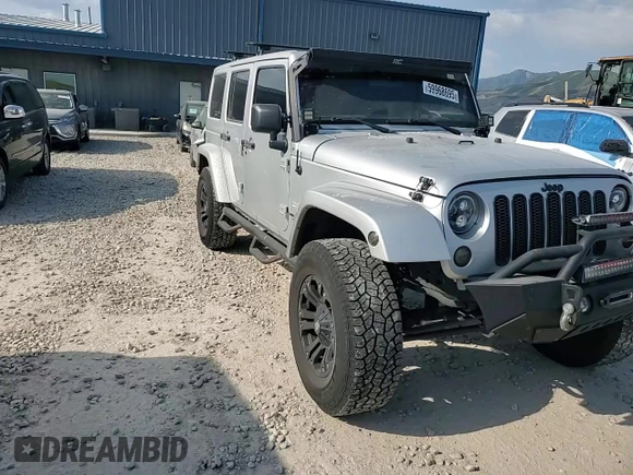 2012 Jeep Wrangler Unlimited Sahara z VIN 1C4HJWEG4CL159731, wystawiony jako Copart lot #59968695 z przebiegiem 111 918 mil mil oraz Szkoda całkowita • Salvage title. Historia ofert i sprzedaży dostępna na DreamBid. Obrazek 13.
