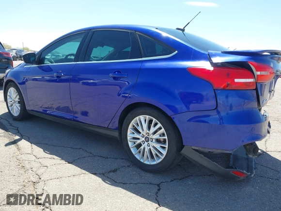 2015 Ford Focus Titanium with VIN 1FADP3J25FL314903, listed as a IAAI auction lot 42053132 with 125,418 mi miles and . Bid and sale history available at carsss.com. Image 3.