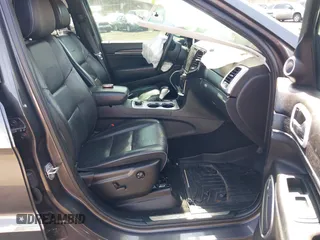 2019 Jeep Grand Cherokee Summit with VIN 1C4RJFJG1KC637757, listed as a IAAI auction lot 41803356 with 95,231 mi miles. Bid and sale history available at carsss.com. Image 5.