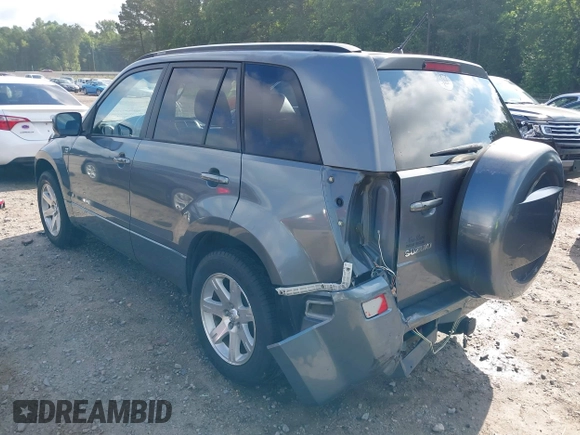 2006 Suzuki Grand Vitara Luxury z VIN JS3TE947864103082, wystawiony jako IAAI lot #42470917 z przebiegiem 155 702 mil mil oraz . Historia ofert i sprzedaży dostępna na DreamBid. Obrazek 3.