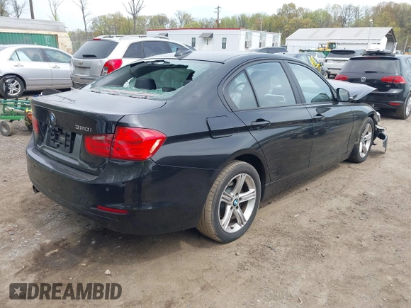 2014 BMW 3 Series 320i xDrive with VIN WBA3C3C59EF984070, listed as a IAAI auction lot 42063569 with 169,002 mi miles and . Bid and sale history available at DreamBid. Image 4.