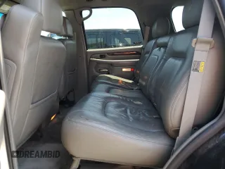 2002 Cadillac Escalade z VIN 1GYEC63T42R189976, wystawiony jako Copart lot #57852565 z przebiegiem 243 089 mil mil oraz Szkody całkowita. Historia ofert i sprzedaży dostępna na DreamBid. Obrazek 11.