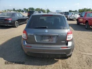 2010 Suzuki SX4 with VIN JS2YB5A24A6300249, listed as a Copart auction lot 71565394 with 291,886 mi miles and Salvage Title. Bid and sale history available at DreamBid. Image 6.