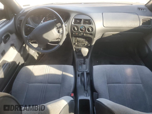 1995 Geo Prizm z VIN 1Y1SK5261SZ077665, wystawiony jako Copart lot #76863434 z przebiegiem 176 535 mil mil oraz Szkody całkowita. Historia ofert i sprzedaży dostępna na DreamBid. Obrazek 8.