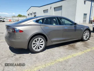 2016 Tesla Model S 70 with VIN 5YJSA1E1XGF147239, listed as a Copart auction lot 56529075 with 82,562 mi miles and Salvage title. Bid and sale history available at DreamBid. Image 3.