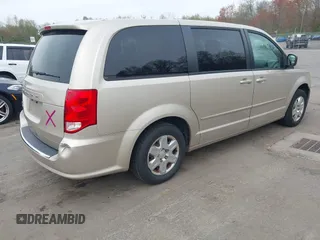 2012 Dodge Grand Caravan SE with VIN 2C4RDGBG4CR298996, listed as a IAAI auction lot 42133423 with 70,354 mi miles and . Bid and sale history available at DreamBid. Image 4.