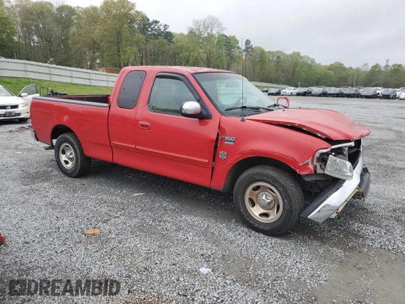 2000 Ford F-150 XL with VIN 1FTRX17W7YNA34762, listed as a Copart auction lot 51190685 with 0 mi miles and Salvage Title. Bid and sale history available at carsss.com. Image 4.