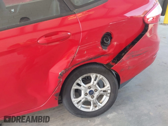 2014 Ford Fiesta SE with VIN 3FADP4BJ1EM210630, listed as a IAAI auction lot 42117897 with 102,553 mi miles and . Bid and sale history available at DreamBid. Image 6.
