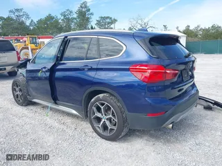 2018 BMW X1 sDrive28i with VIN WBXHU7C34J5H44572, listed as a IAAI auction lot 41607151 with 43,056 mi miles. Bid and sale history available at carsss.com. Image 3.