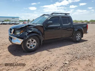 2005 Nissan Frontier LE with VIN 1N6AD07U85C437877, listed as a Copart auction lot 63118145 with 166,752 mi miles and Salvage title. Bid and sale history available at DreamBid. Image 1.