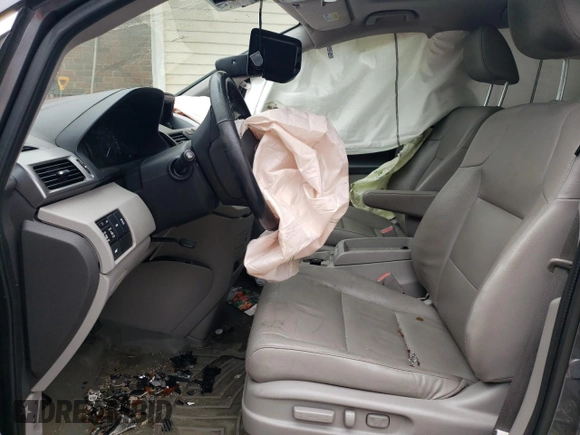 2014 Honda Odyssey EX-L with VIN 5FNRL5H69EB125480, listed as a Copart auction lot 59988475 with Not provided miles and Salvage title. Bid and sale history available at DreamBid. Image 7.