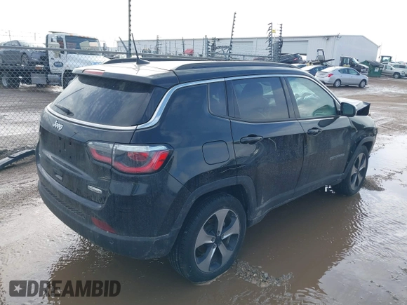 2020 Jeep Compass Latitude with VIN 3C4NJDBB1LT112676, listed as a IAAI auction lot 41651583 with 73,528 mi miles. Bid and sale history available at carsss.com. Image 4.