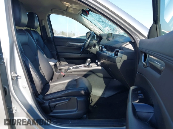 2020 Mazda CX-5 Touring with VIN JM3KFACM8L0727393, listed as a IAAI auction lot 41492627 with 91,521 mi miles. Bid and sale history available at carsss.com. Image 5.