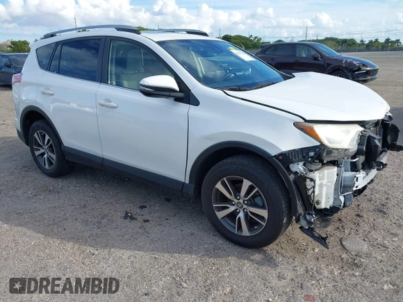2018 Toyota RAV4 XLE with VIN JTMWFREV7JJ174483, listed as a IAAI auction lot 41597797 with 82,836 mi miles. Bid and sale history available at carsss.com. Image 1.