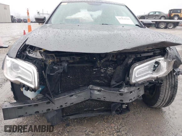 2014 Chrysler 300 with VIN 2C3CCAAG7EH377454, listed as a IAAI auction lot 41964310 with 277,209 mi miles. Bid and sale history available at carsss.com. Image 6.