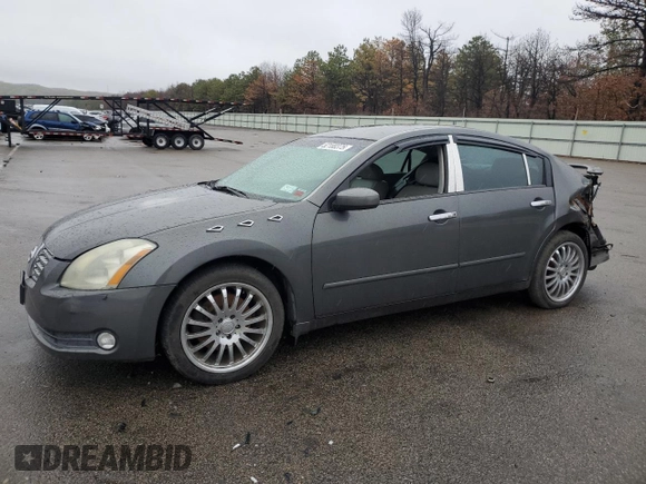 2004 Nissan Maxima SE with VIN 1N4BA41E14C901248, listed as a Copart auction lot 52100375 with 124,473 mi miles and Salvage Title. Bid and sale history available at DreamBid. Image 1.