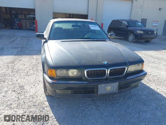 1998 BMW 7 Series 740il with VIN WBAGJ8323WDM13455, listed as a IAAI auction lot 41888636 with 1 mi miles. Bid and sale history available at carsss.com. Image 6.