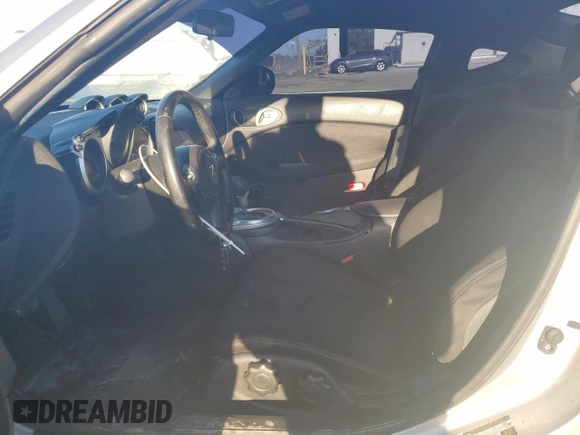 2015 Nissan 370Z with VIN JN1AZ4EH2FM443464, listed as a Copart auction lot 83410654 with 116,692 mi miles and Salvage Title. Bid and sale history available at carsss.com. Image 7.