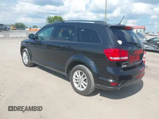 2013 Dodge Journey SXT with VIN 3C4PDDBG1DT615217, listed as a IAAI auction lot 42728052 with 234,347 mi miles and . Bid and sale history available at DreamBid. Image 3.