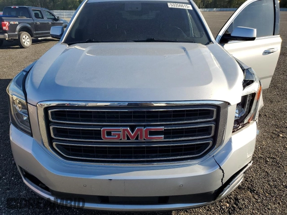 2015 GMC Yukon SLT z VIN 1GKS1BKC7FR527678, wystawiony jako Copart lot #53356615 z przebiegiem 110 125 mil mil oraz Szkoda całkowita • Salvage title. Historia ofert i sprzedaży dostępna na DreamBid. Obrazek 14.
