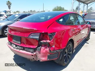 2023 Tesla Model 3 z VIN 5YJ3E1EA4PF454981, wystawiony jako IAAI lot #42704135 z przebiegiem 93 008 mil mil oraz . Historia ofert i sprzedaży dostępna na DreamBid. Obrazek 4.
