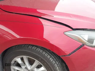 2014 Mazda 3 i Touring with VIN JM1BM1V76E1158983, listed as a IAAI auction lot 41612119 with 160,136 mi miles and . Bid and sale history available at DreamBid. Image 6.