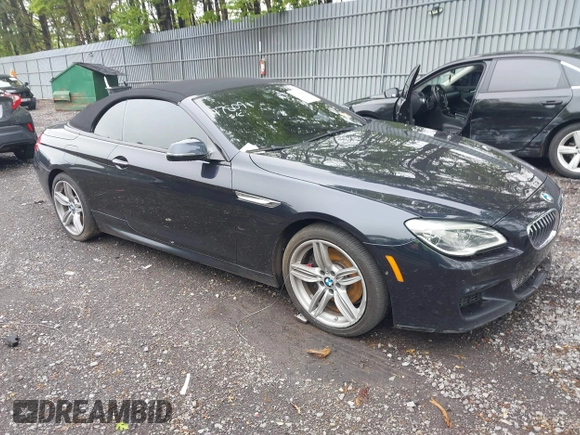 2017 BMW 6 Series 650i xDrive z VIN WBA6F7C52HD930816, wystawiony jako IAAI lot #42168478 z przebiegiem 89 191 mil mil oraz . Historia ofert i sprzedaży dostępna na DreamBid. Obrazek 1.