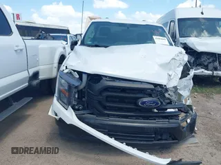 2023 Ford F-150 XL with VIN 1FTMF1C57PKD08603, listed as a IAAI auction lot 41804602 with Not provided miles and . Bid and sale history available at DreamBid. Image 12.