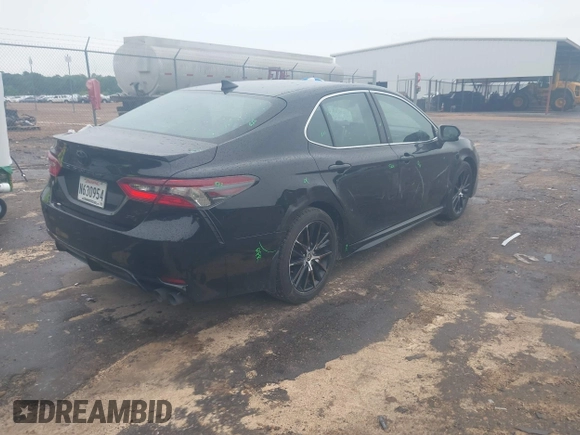 2023 Toyota Camry SE with VIN 4T1G11AKXPU827360, listed as a IAAI auction lot 42217356 with 57,497 mi miles and . Bid and sale history available at DreamBid. Image 4.