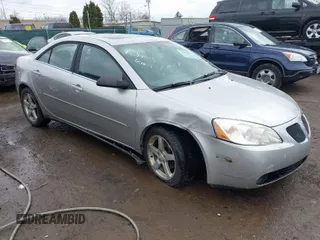 2006 Pontiac G6 6-Cyl with VIN 1G2ZG558464289212, listed as a IAAI auction lot 41994843 with 126,502 mi miles. Bid and sale history available at carsss.com. Image 1.